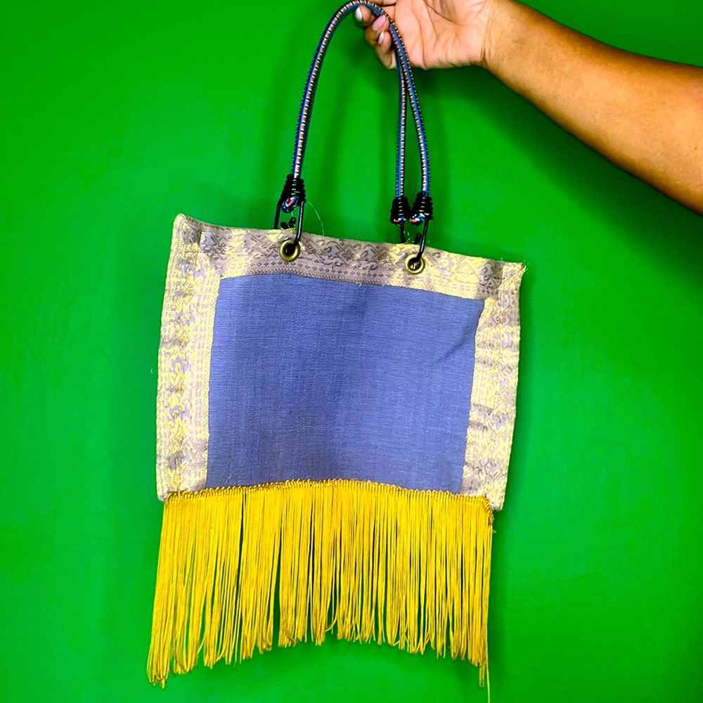 Tissabell by Christine Ingrid Zellmer bungee cord handle, purple & gold w/fringe